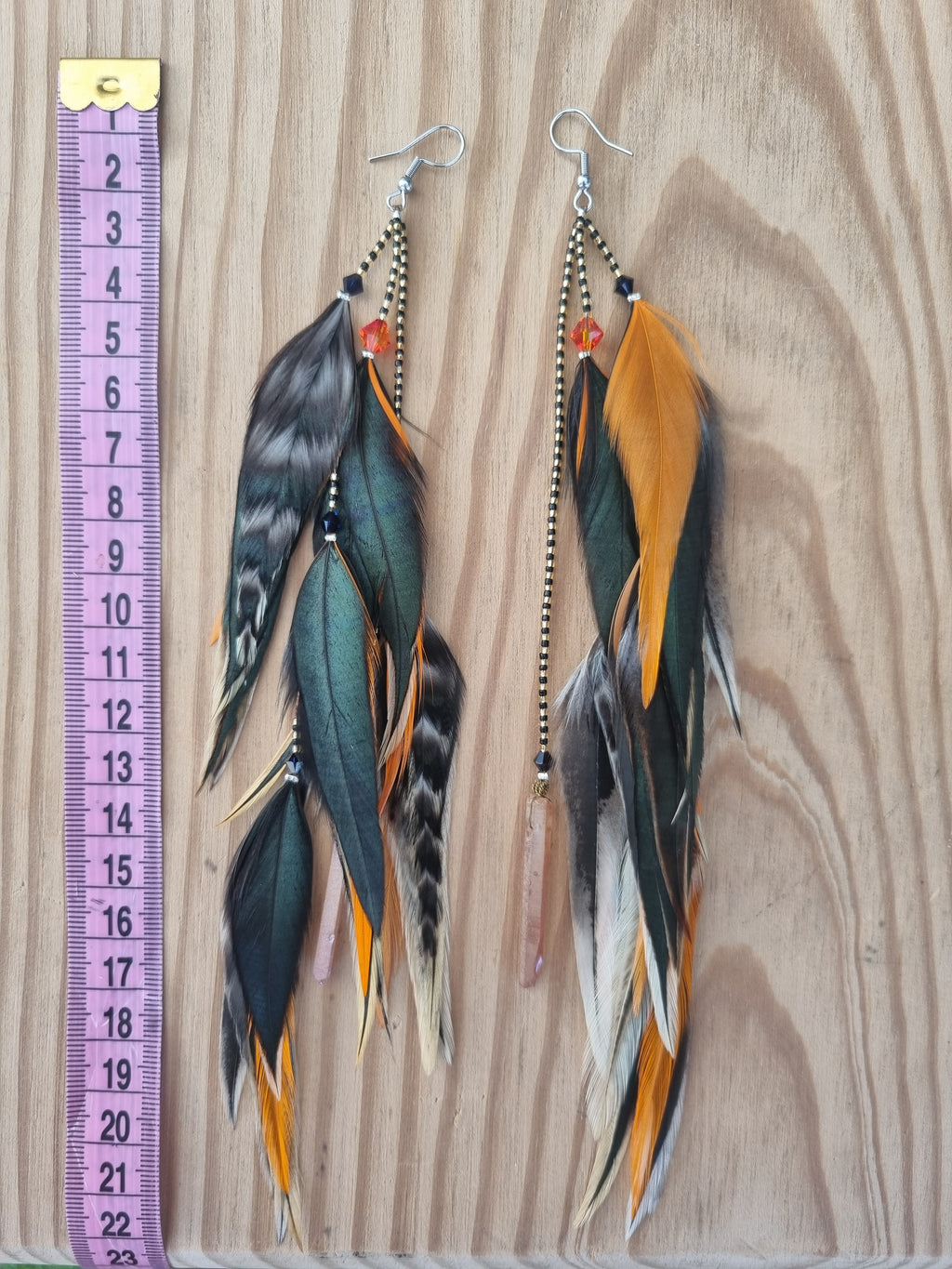 Feather earrings • Orange stripes